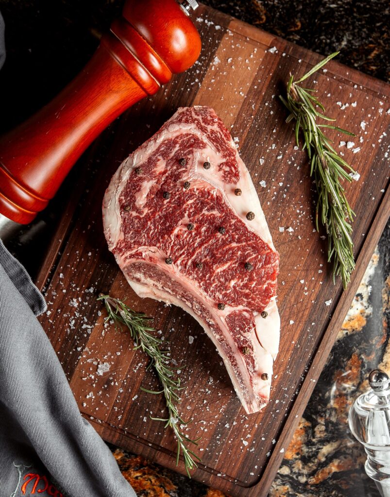 raw meat slice with salt cutting desk
